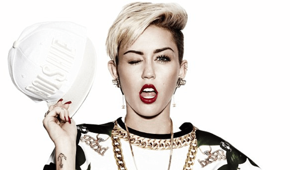 Miley Cyrus Poses in Underwear and Sweater With Leaves On It