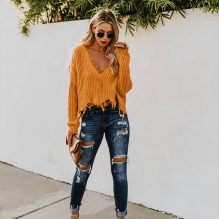 STYLECASTER | How to Wear Ripped Jeans: Street Style Inspiration