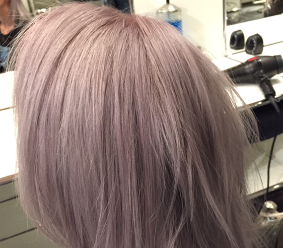 A gorgeous lavender/gray fade sitting in the salon chair.