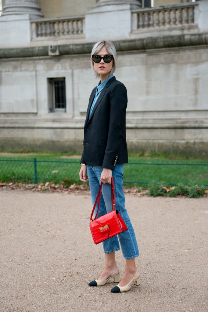 PARIS, FRANCE - OCTOBER 6: Fashion Blogger Linda Tol wears Chanel shoes, Saint Laurent jacket, Calvin Klein shirt, Acne jeans, Fendi sunglasses and a Loewe bag on day 8 during Paris Fashion Week Spring/Summer 2016/17 on October 6, 2015 in London, England. (Photo by Kirstin Sinclair/Getty Images)*** Local Caption *** Linda Tol
