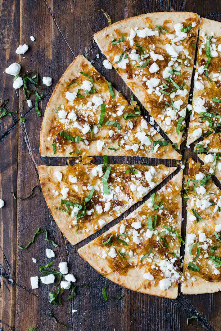 STYLECASTER | 25 Festive Recipes That Will Impress Your Friends on New Year’s Eve | Flatbread with Goat Cheese and Caramelized Onion