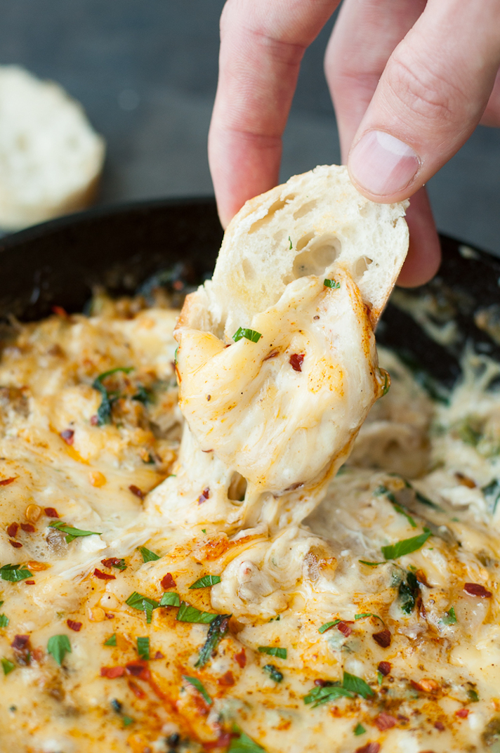 STYLECASTER | 25 Festive Recipes That Will Impress Your Friends on New Year’s Eve | Baked Seafood Dip