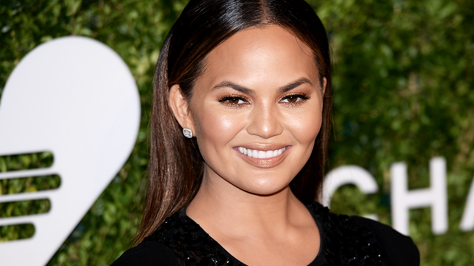 Chrissy Teigen Shares Old Cheerleading Photo