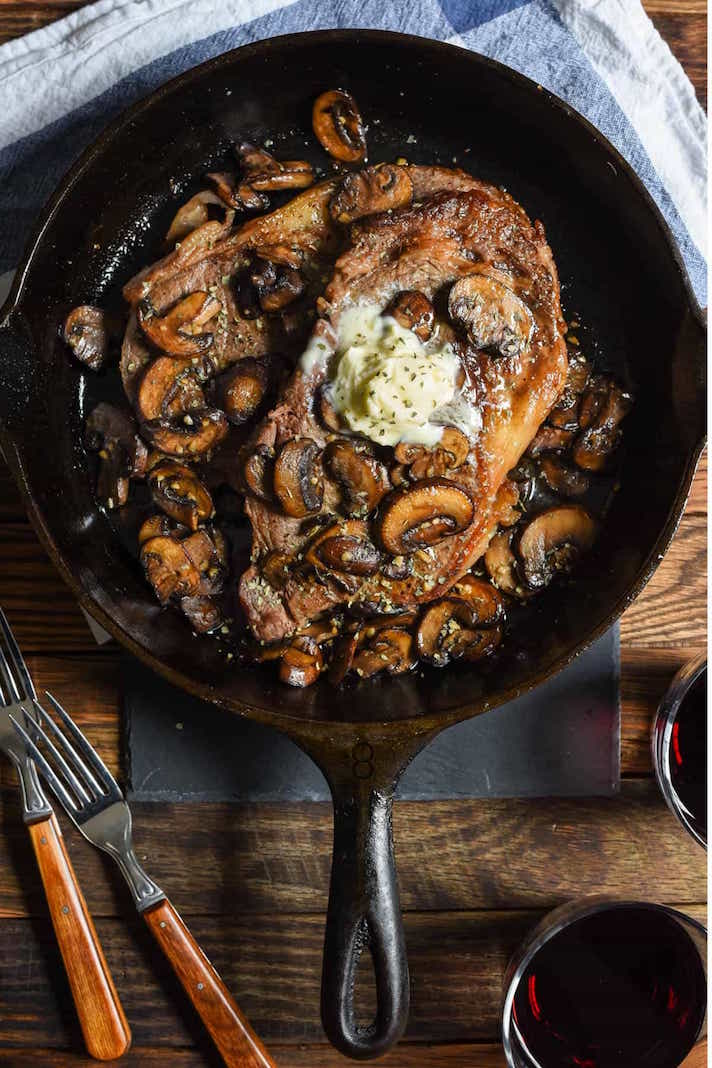 STYLECASTER | 17 Fancy Date Night Dinners That Are Actually Super Easy | Cast-Iron Ribeye With Mushrooms