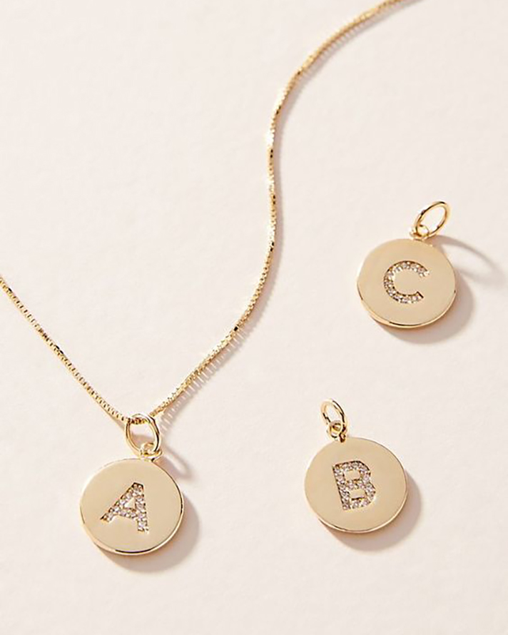 STYLECASTER | Word and Name Jewelry Is Having a Moment, Because Carrie Bradshaw Is a Forever Fashion Icon