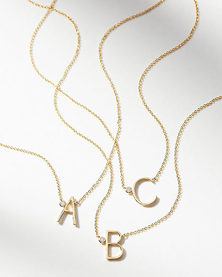 STYLECASTER | Word and Name Jewelry Is Having a Moment, Because Carrie Bradshaw Is a Forever Fashion Icon