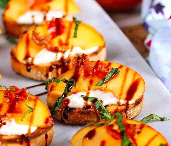 STYLECASTER | 17 Fourth of July Appetizers That Every Barbecue Needs | Honey, Ricotta, and Peach Crostini