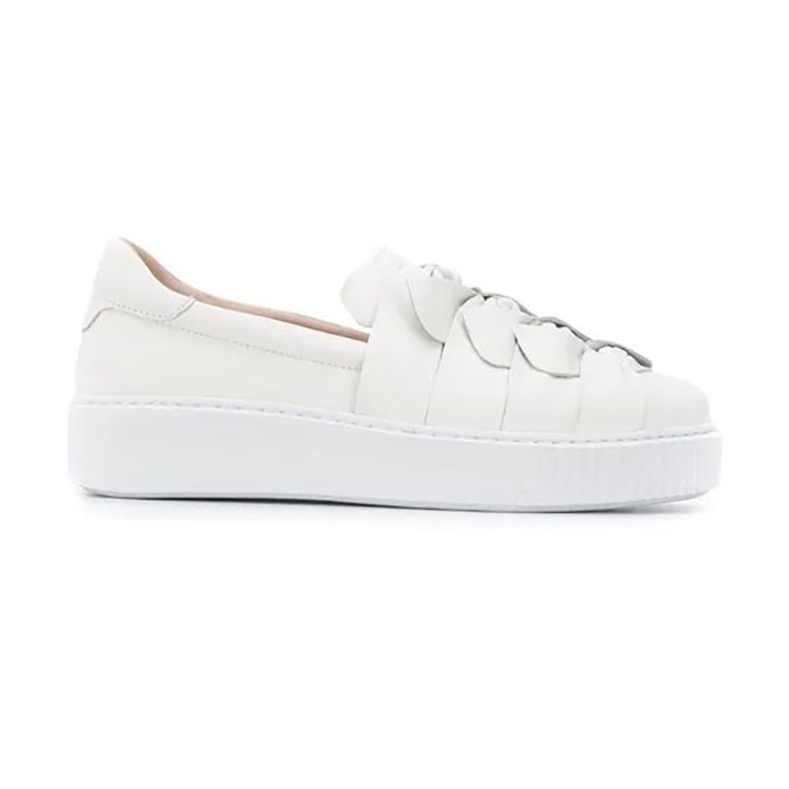 STYLECASTER | Dainty White Sneakers You Could Definitely Wear Under Your Bridal Gown