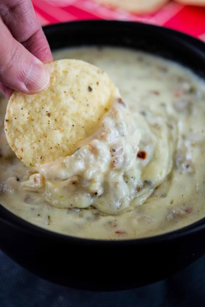 STYLECASTER | 17 Slow-Cooker Queso Dips So Sexy, I Could Cry | Sausage and Pepper Jack Cheese Dip