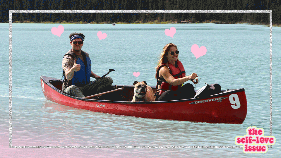 Justine Goodman, Dave Stangle and their bulldog Frank in a canoe on Lake Louise in Banff National Park, Canada