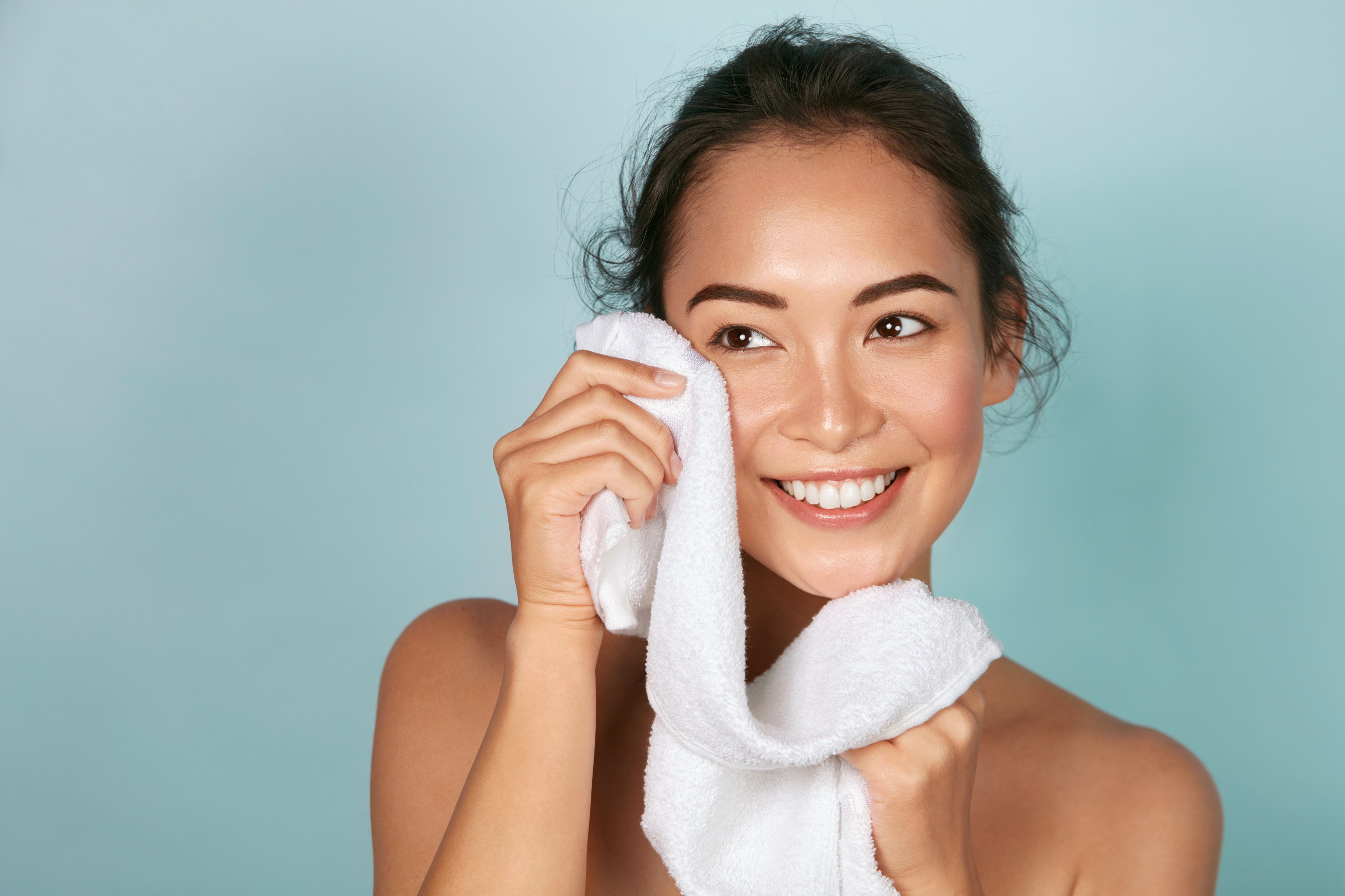 Removing Makeup with Towel Adobe