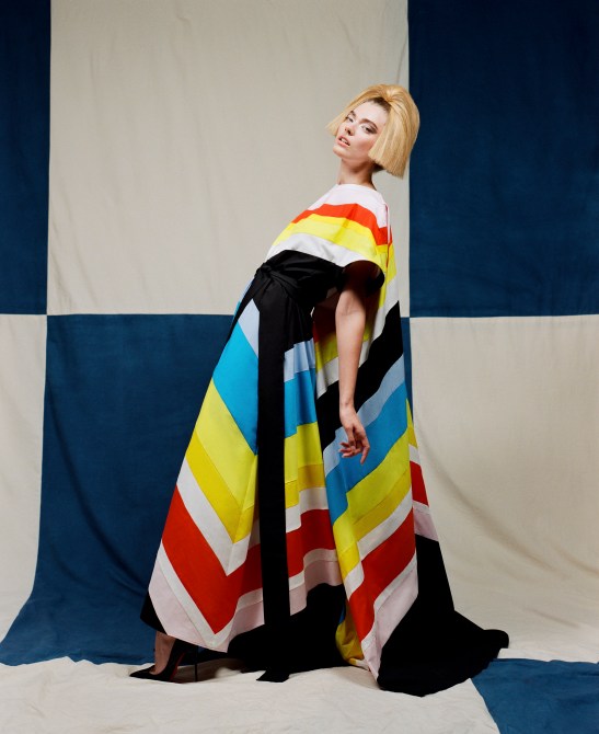 STYLECASTER | Anne Hathaway Rainbow Jumpsuit