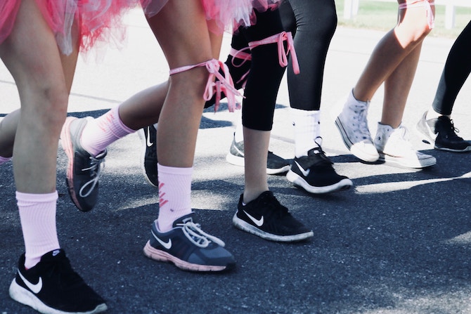 Kids participating in a three-legged race