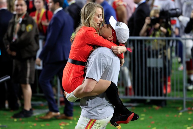 Patrick Mahomes #15 of the Kansas City Chiefs celebrates with his girlfriend, Brittany Matthews, after defeating the San Francisco 49ers 31-20 in Super Bowl LIV at Hard Rock Stadium on February 02, 2020 in Miami, Florida.
