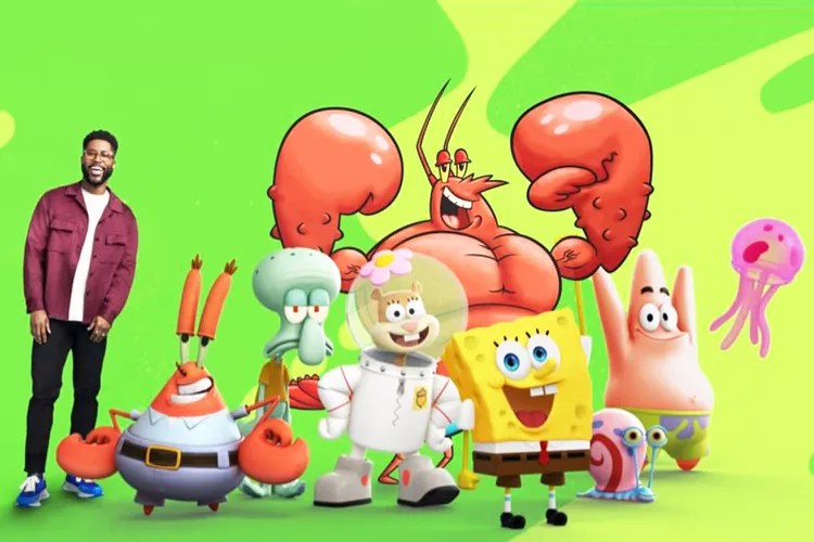 CBS Sports analyst Nate Burleson with cast of SpongeBob SquarePants for Nickelodeon Super Bowl.