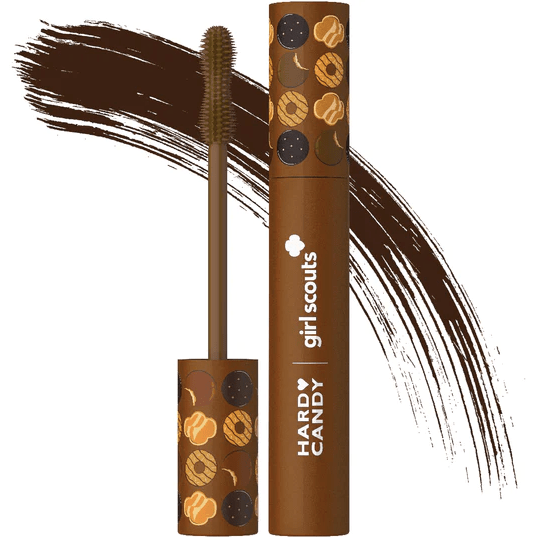 A tube of Hard Candy x Girl Scouts Cookie Batter Mascara next to a mascara brush and swatch of brown mascara