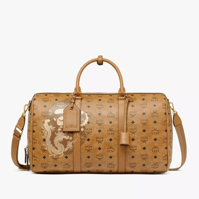 A printed brown leather weekender bag from the MCM x BAPE collaboration