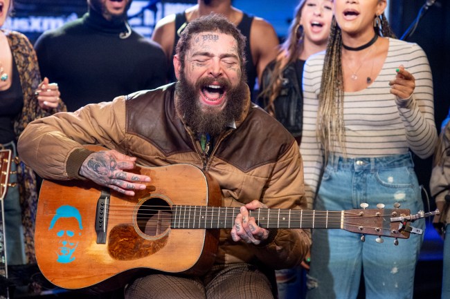 Post Malone Net Worth. Post Malone visits SiriusXM's 'The Howard Stern Show' at SiriusXM Studios on October 17, 2023 in Los Angeles, California.