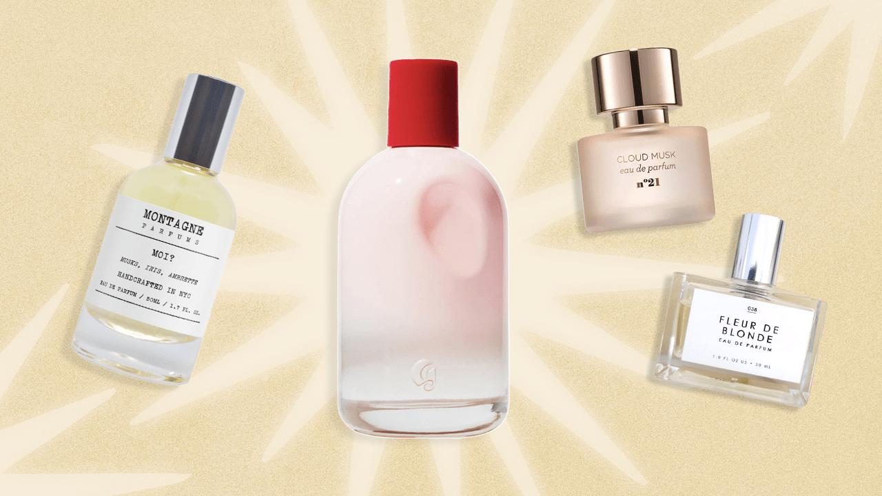 Glossier You in a pink bottle with a red cap in the center surrounded by similar smelling perfumes. The background is gold with stars.