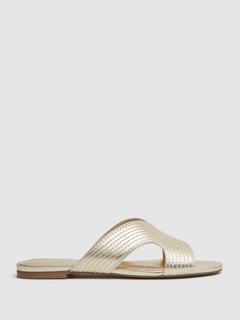 Gold Slip-on Sandals displayed with a white background.