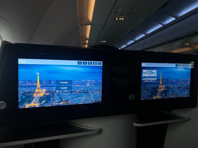 Two side-by-side screens onboard the La Compagnie airline