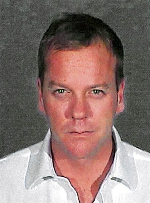 In this handout photo provided by the Glendale City Police Department , actor Kiefer Sutherland poses for his mugshot photo at Glendale City Jail December arrested for 5, 2007 in Glendale City, California. Sutherland, 40,  reported to the facility to serve a 48-day sentance after pleading guilty to a second drunk driving offense.