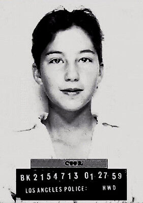 Cher in a black and white mugshot