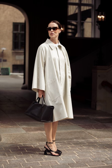 STYLECASTER | Minimalist Outift Ideas, coat dress, black handbag, open toed pumps, dries van noten, the row