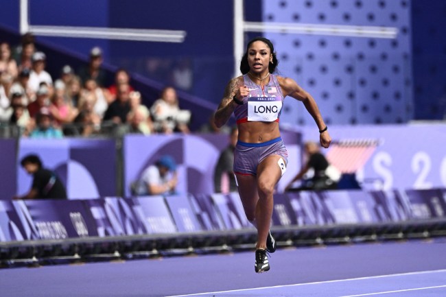 US' Mckenzie Long competes in the women's 200m heat of the athletics event at the Paris 2024 Olympic Games at Stade de France in Saint-Denis, north of Paris, on August 4, 2024.
