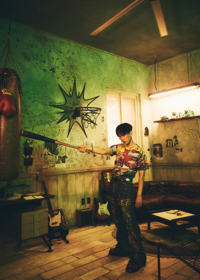 Baekhyun holding a baseball bat