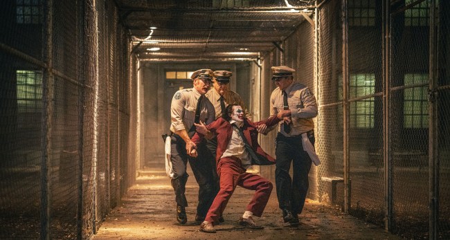 JOKER: FOLIE A DEUX, (aka JOKER 2), Joaquin Phoenix as Joker (center front), Brendan Gleeson (center back), 2024.