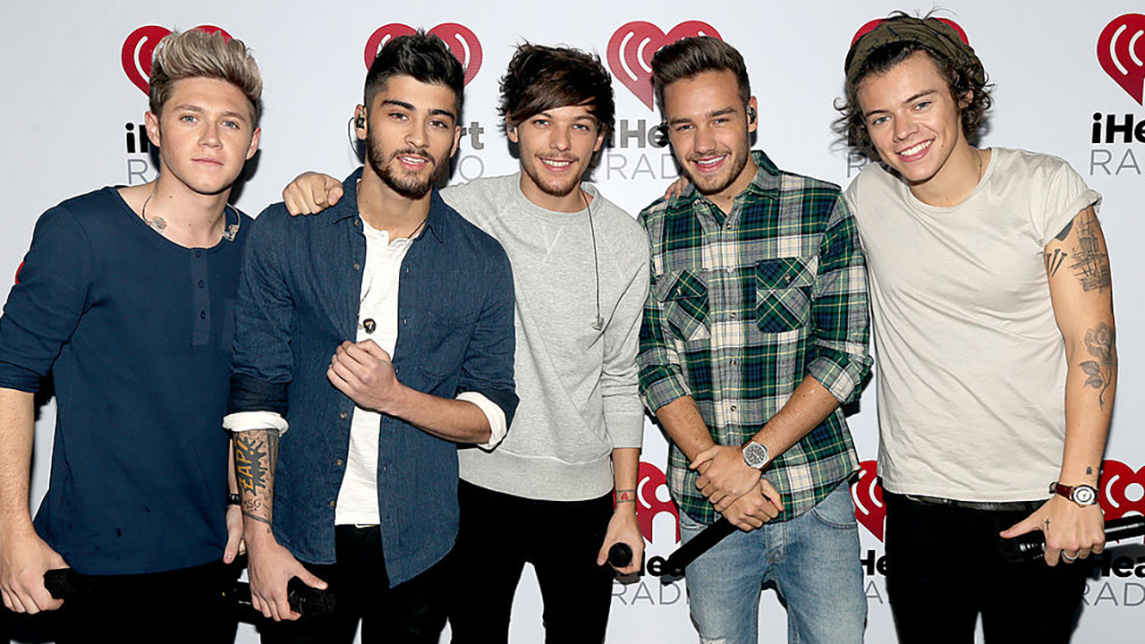 Musicians Niall Horan, Zayn Malik, Louis Tomlinson, Liam Payne, and Harry Styles of the band One Direction during the "One Direction iHeartRadio Album Release Party" hosted by Ryan Seacrest at the iHeartRadio Theater Los Angeles  Clear Channel's new music and events venue located at The Burbank Studios in Burbank, CA