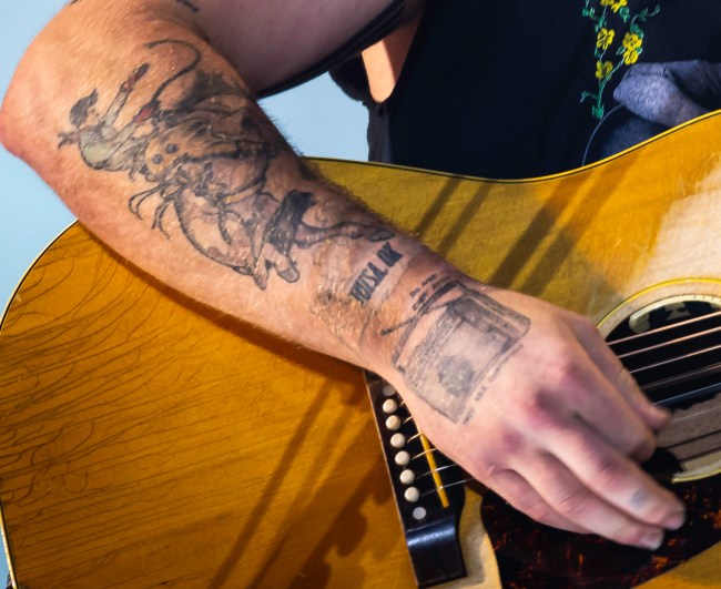 NASHVILLE, TENNESSEE - JUNE 29: Zach Bryan performs during the Quittin Time tour at Nissan Stadium on June 29, 2024 in Nashville, Tennessee.