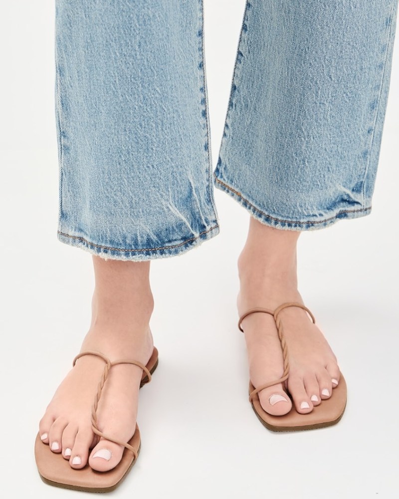7 Top Sandal Trends 2025: Thongs, Platforms, & Skinny Straps