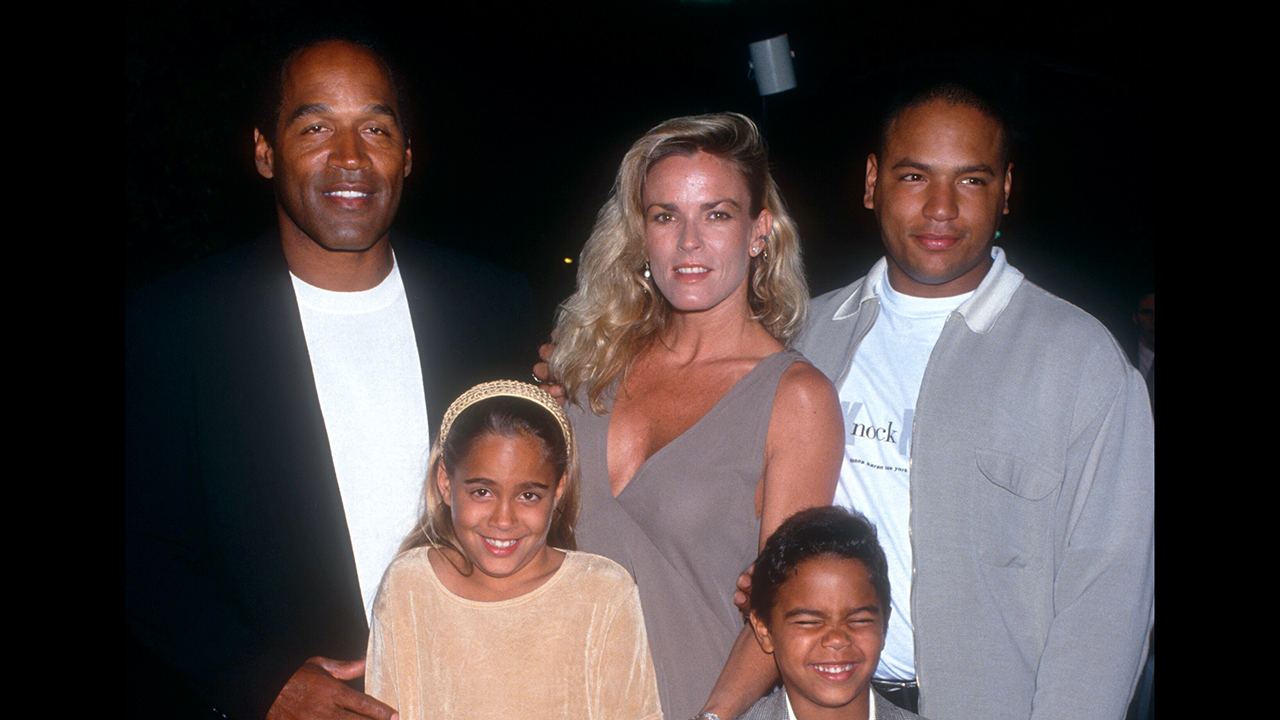 HOLLYWOOD - MARCH 16: O.J. Simpson and Nicole Brown Simpson (1959-1994) walk the red carpet with their children Jason Simpson, Sydney and Justin as they attend the 'Naked Gun 33 1/3: The Final Insult' Hollywood Premiere on March 16, 1994 at the Paramount Studios in Hollywood, California. Nicole Brown Simpson shown here three months before her death on June 12, 1994.