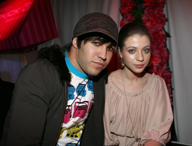 BEVERLY HILLS, CA - OCTOBER 12:  Musician Pete Wentz (L) and actress Michelle Trachtenberg (R) attend the Launch of T-Mobile Sidekick 3 Limited Edition at Mr. Chow on October 12, 2006 in Beverly Hills, California.