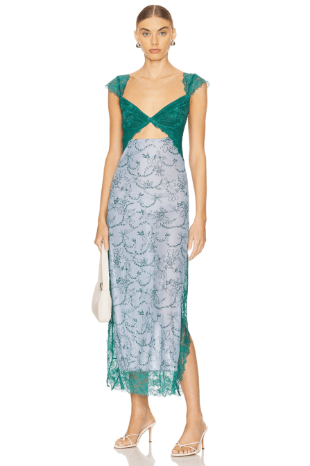 A model wearing the Free People x Intimately FP Suddenly Fine Maxi Slip Dress in a light blue and emerald green colorway