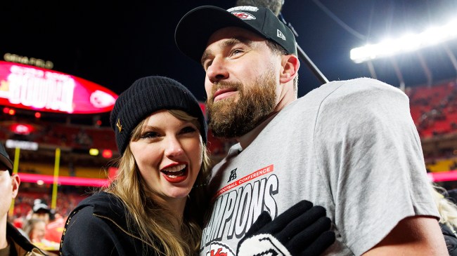 KANSAS CITY, MISSOURI - JANUARY 26: Tight end Travis Kelce #87 of the Kansas City Chiefs celebrates with Taylor Swift after the AFC Championship football game against the Buffalo Bills, at GEHA Field at Arrowhead Stadium on January 26, 2025 in Kansas City, Missouri.