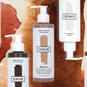 dpHUE Gloss+ bottles on a watercolor background