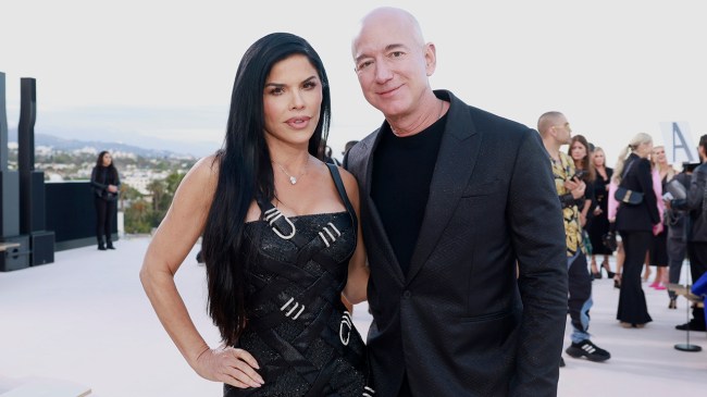 WEST HOLLYWOOD, CALIFORNIA - MARCH 09: (L-R) Lauren Sánchez and Jeff Bezos attend the Versace FW23 Show at Pacific Design Center on March 09, 2023 in West Hollywood, California.