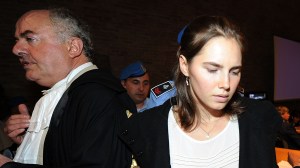 PERUGIA, ITALY - SEPTEMBER 26:  The public prosecutor Giuliano Mignini and Amanda Knox attend Amnada Knox's appeal hearing on September 26, 2011 in Perugia, Italy.  Amanda Knox is awaiting the verdict of her appeal that could see her conviction for the murder of Meredith Kercher overturned. American student Amanda Knox and her Italian ex-boyfriend Raffaele Sollecito, who were convicted of killing their British roommate Meredith Kercher in 2007, have severed nearly four years in jail after being sentenced to 26 and 25 years respectively.